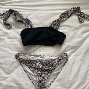 Cute leopard print bathing suit, worn once, tie straps, size small.